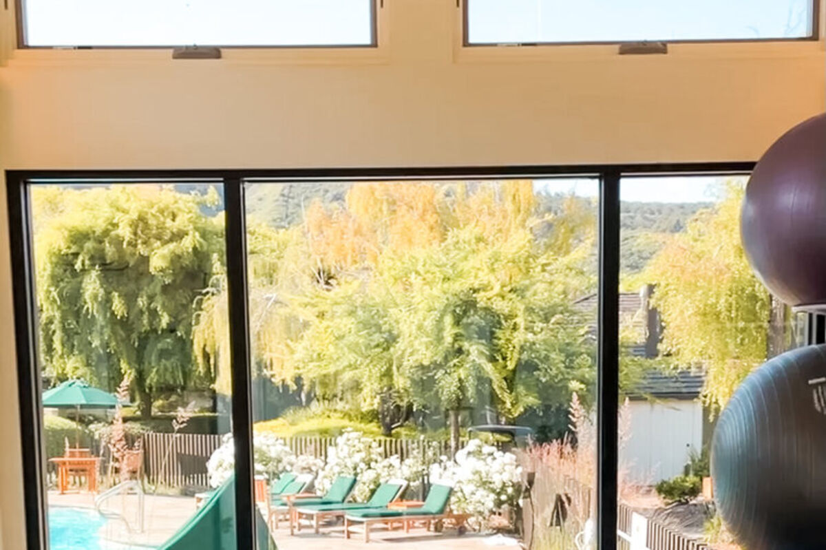 Practice%20yoga%20overlooking%20the%20pool%20of%20the%20resort%2E