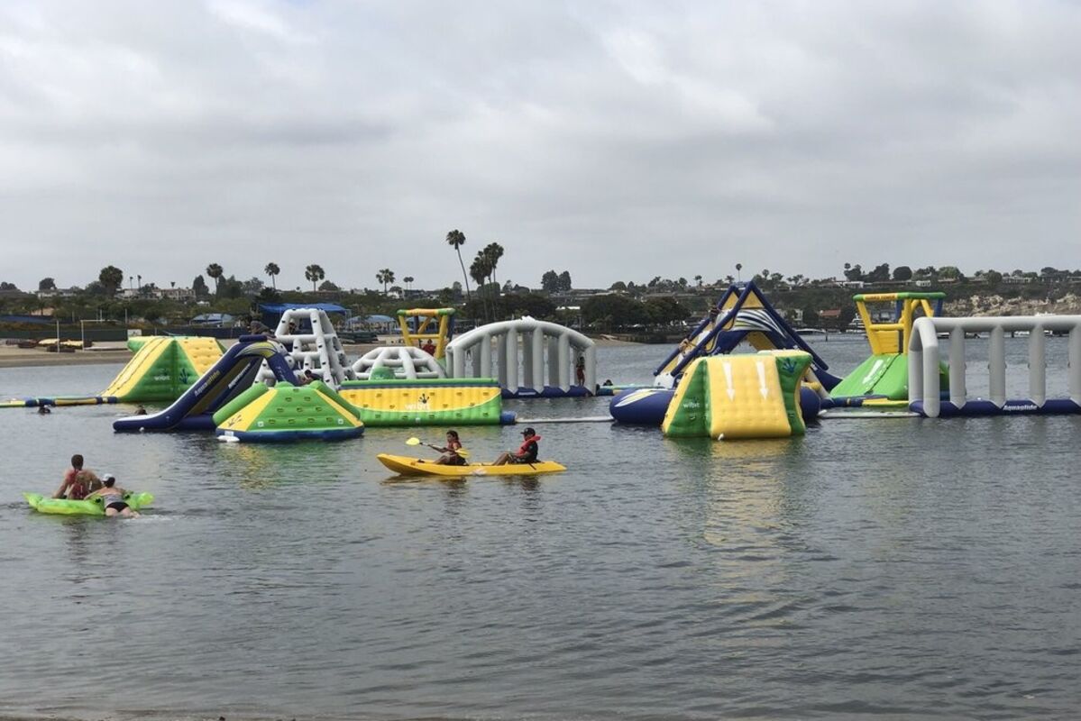 Giant%20inflatable%20obstacle%20course%20floating%20in%20a%20lagoon