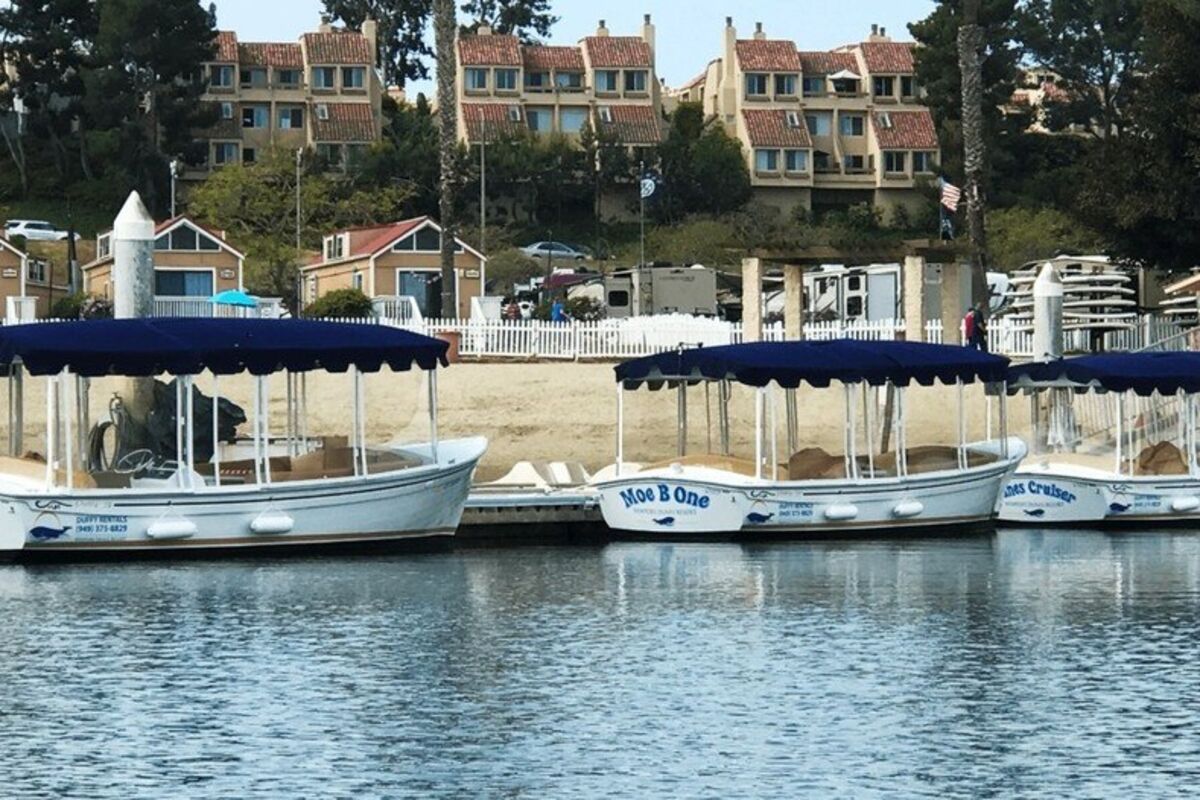 Three%20duffy%20boats%20waiting%20to%20go%20out%20into%20the%20lagoon%2E