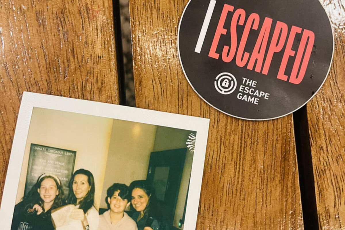 A%20polaroid%20photo%20of%20family%20attending%20an%20escape%20room%20in%20Los%20Angeles