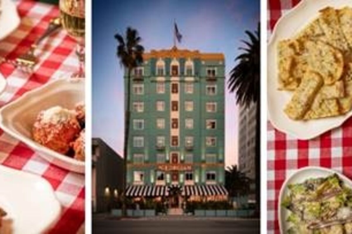Spaghetti%20Sunday%20menu%20with%20salad%2C%20pasta%2C%20and%20a%20view%20of%20the%20hotel%2E